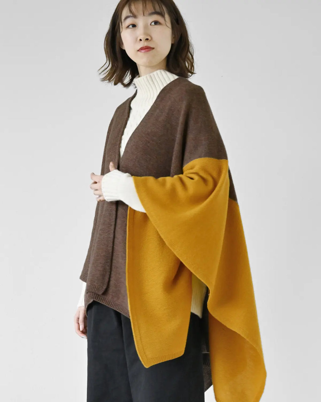 羽織るポンチョ ツートンカラー ウール | SAIFUKU -snow country knit